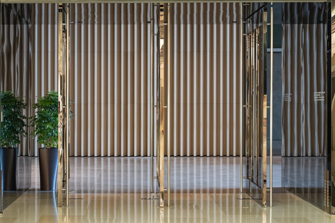 modern-entrance-with-striped-curtains-and-plants-uz0-jidzv50