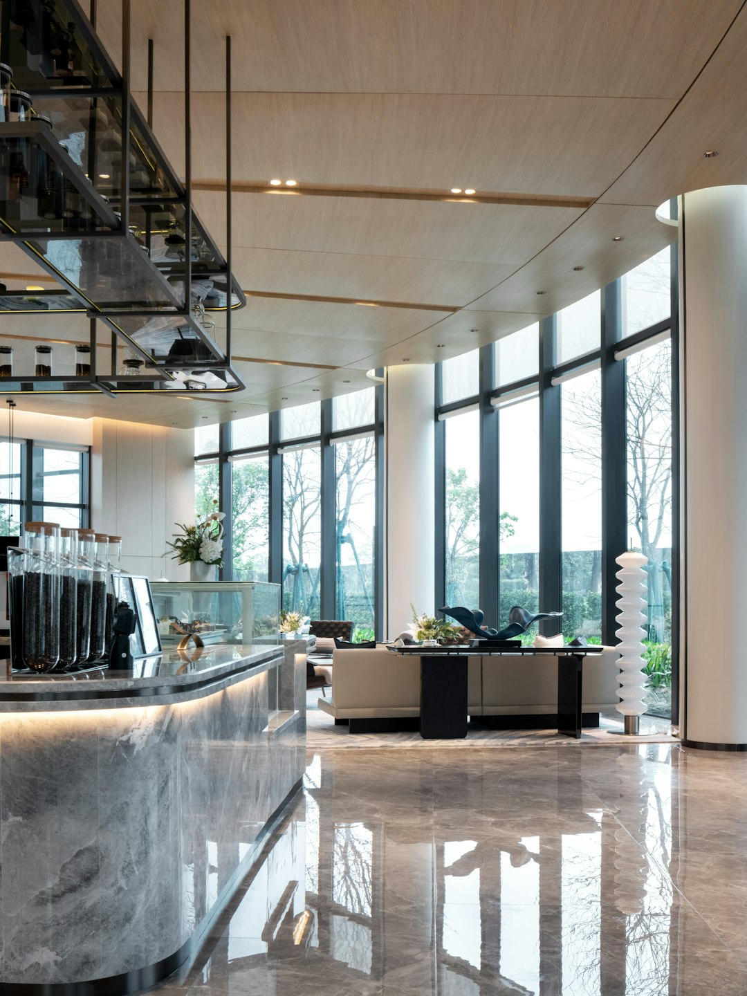 modern-lobby-with-marble-counter-and-large-windows-yf0cq0rzg0g
